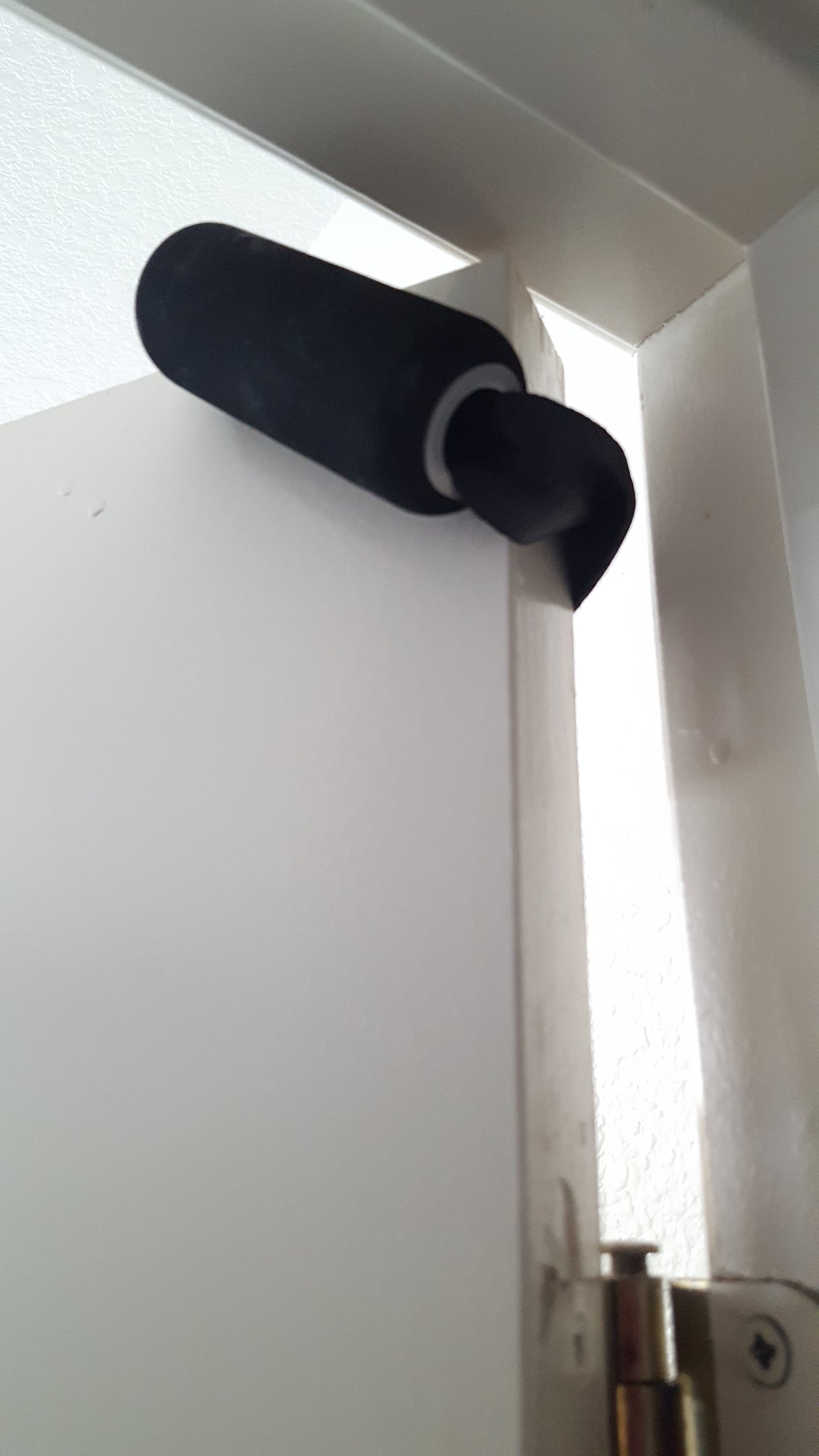 Padded Door Anchor on Door Corner on far side